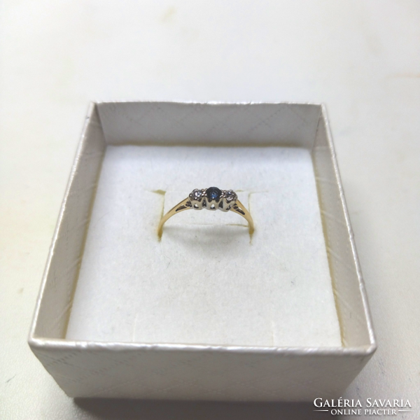 Yellow gold ring with diamonds and sapphires