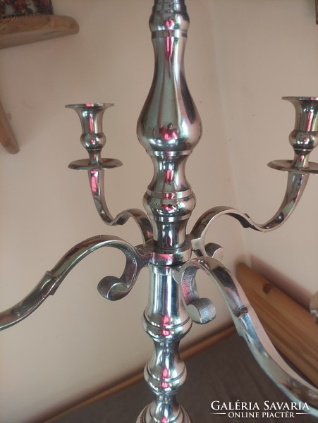 Huge copper 5-branch candle holder for a castle in a dining room for a wedding