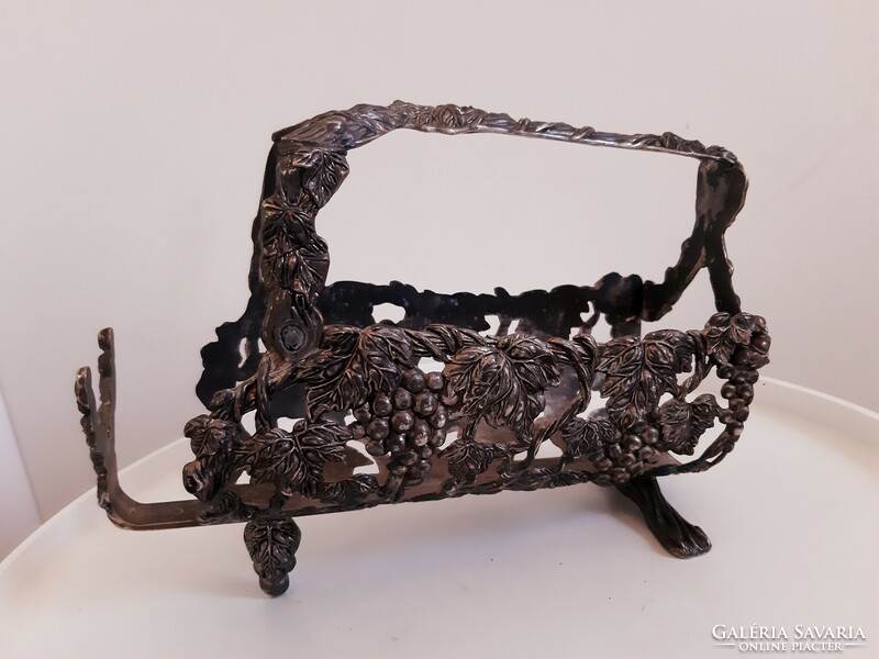 Wine rack with silver-plated grape clusters