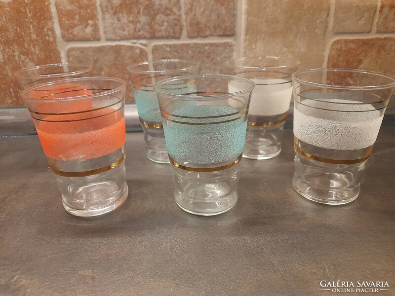 Retro glass cup set, with gold decor, colored surface.
