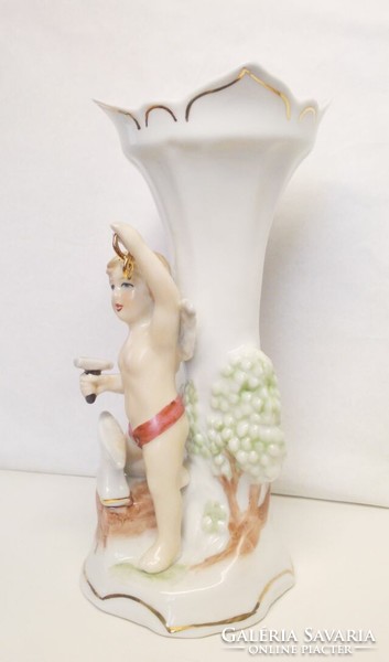 Vase with a goldsmith's angel. Baroque style figural porcelain in perfect condition