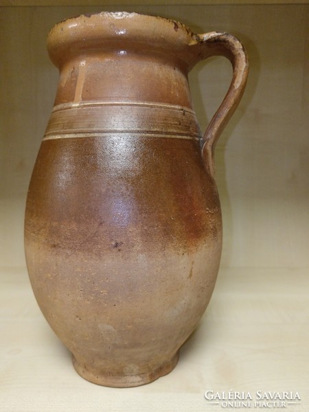 Brown ceramic jug