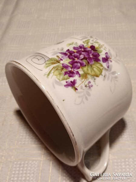 Old porcelain koma mug with violet pattern