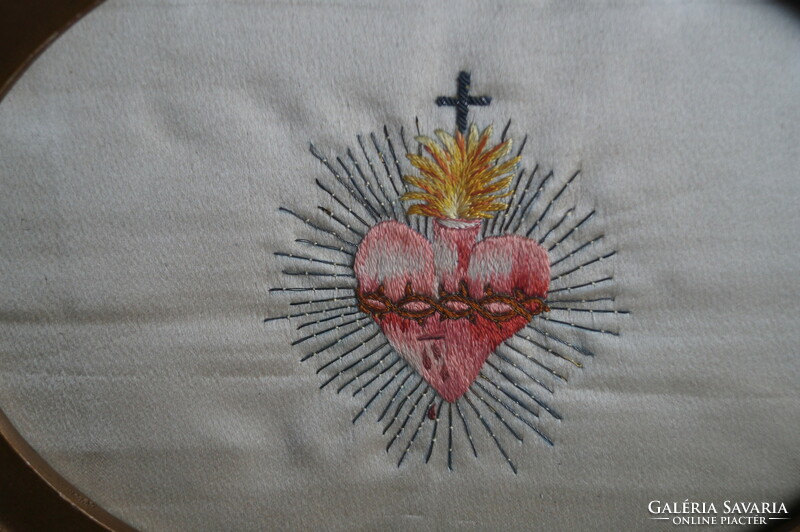 Embroidered religious image.