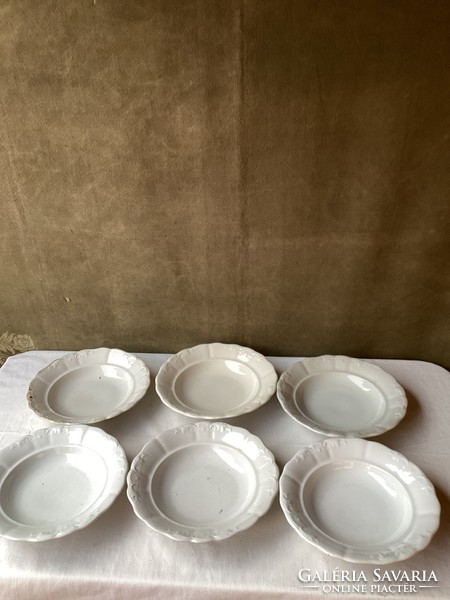 Six deep peasant plates with Zsolnay tendril pattern.