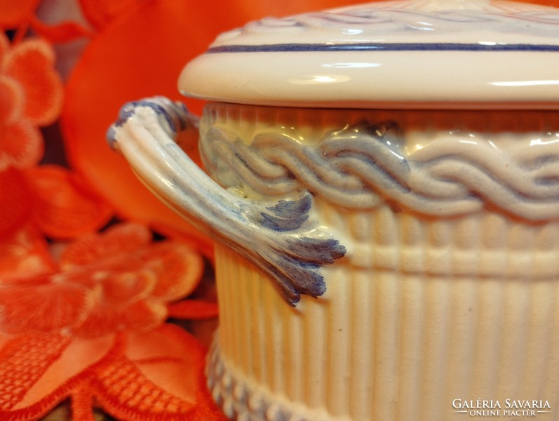 A rare, old sugar bowl with a ribbed surface