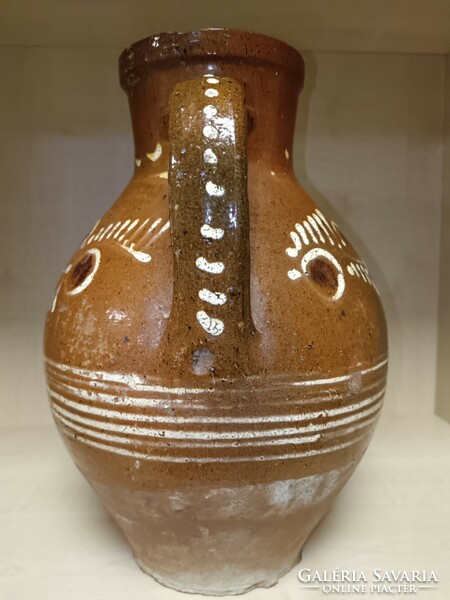 Large brown ceramic jug
