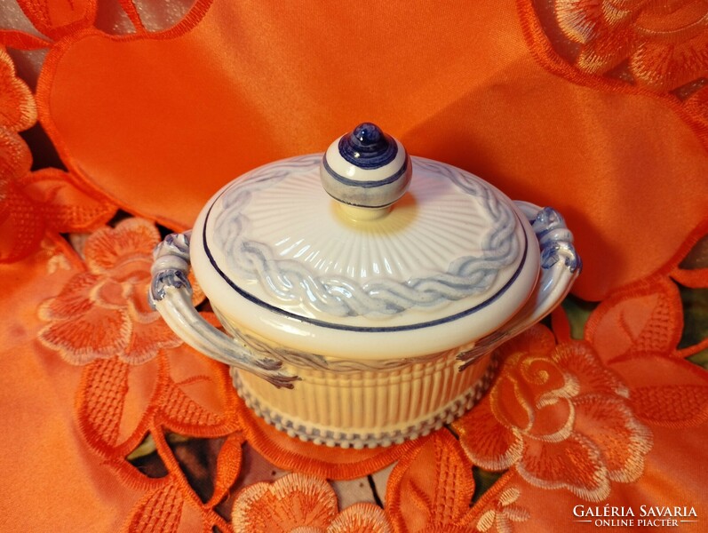 A rare, old sugar bowl with a ribbed surface