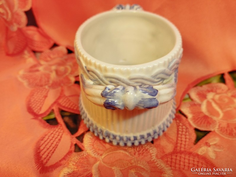 A rare, old sugar bowl with a ribbed surface