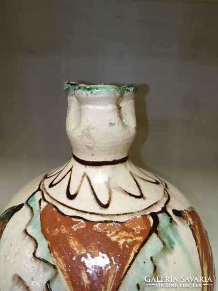 Rattling earthenware jug