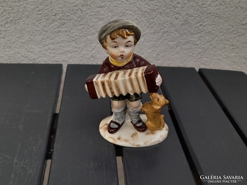 Beautiful German porcelain accordion boy