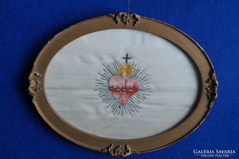 Embroidered religious image.