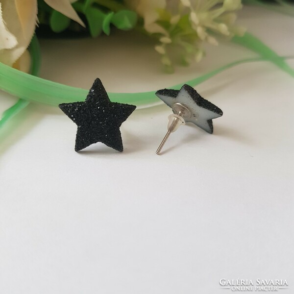 New, shiny black, star-shaped earrings, bijou