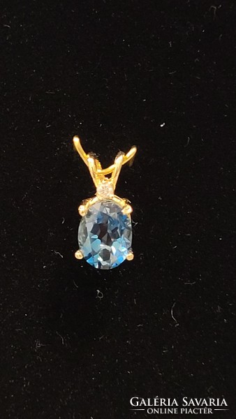 14 K gold blue stone women's pendant 1 g