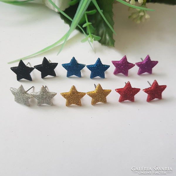 New, shiny silver-colored, star-shaped earrings, bijou