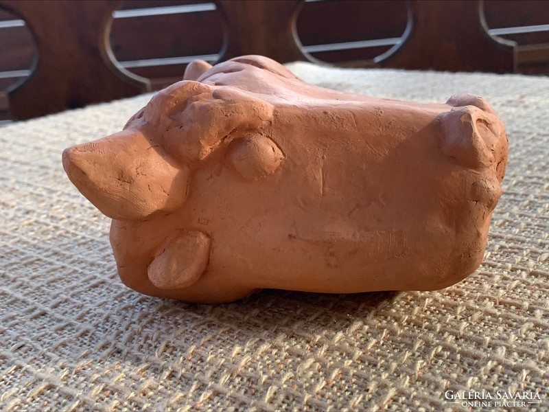 Marked terracotta cow head, mark m 2002.