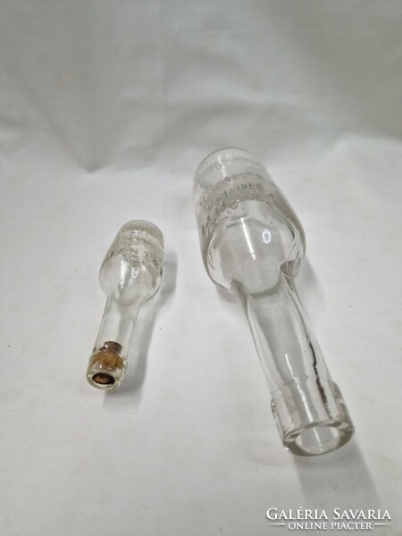 Small and large Virtue diana salted wine bottles, in good condition.