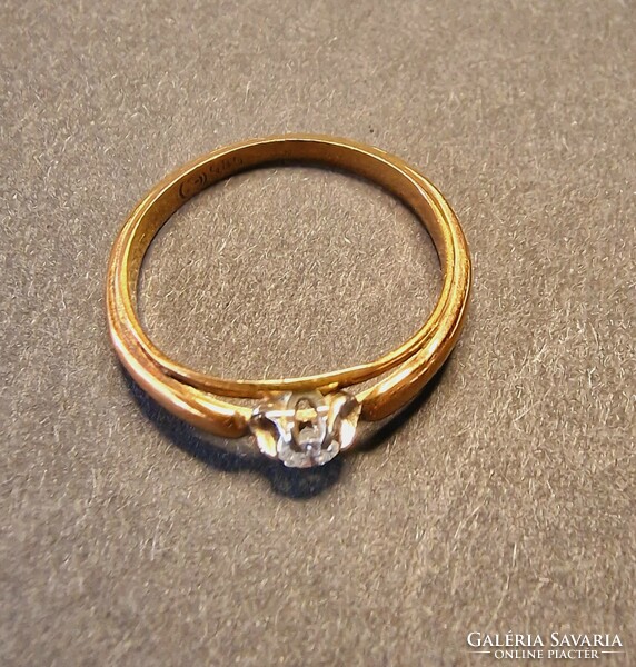 Gold ring with diamond stone