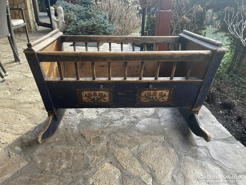 Old painted cradle