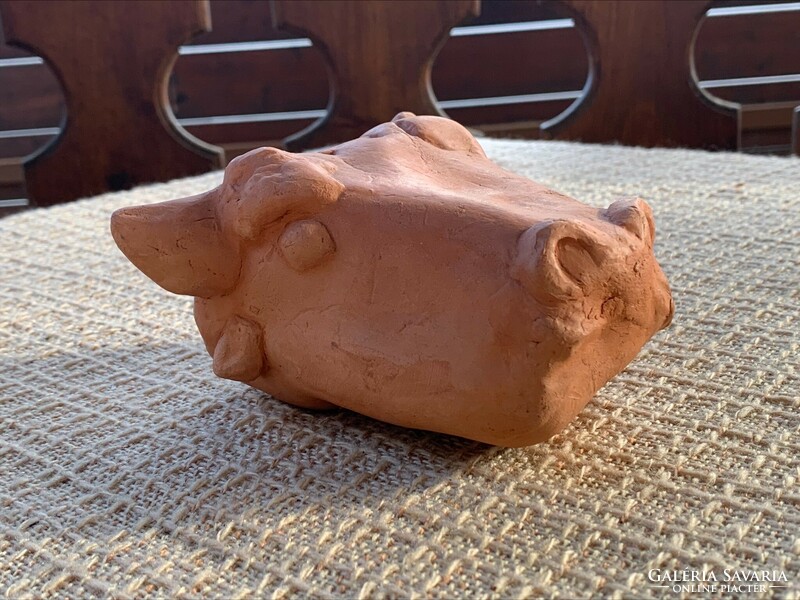 Marked terracotta cow head, mark m 2002.