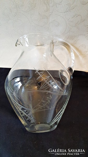 Old polished glass jug.