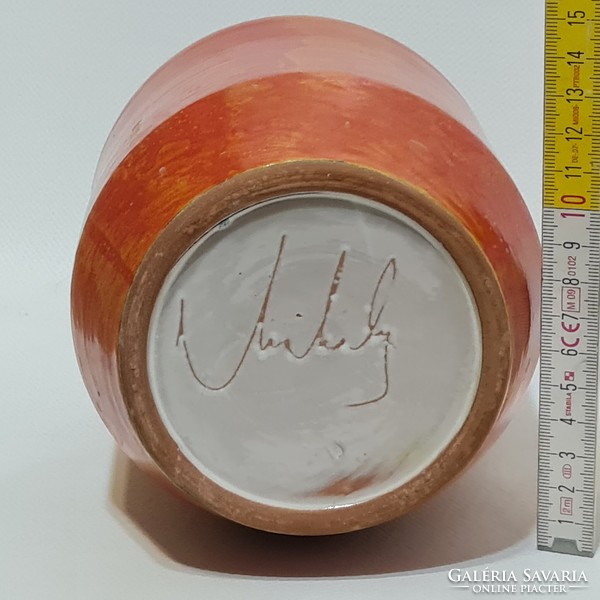 Orange glazed ceramic vase marked 