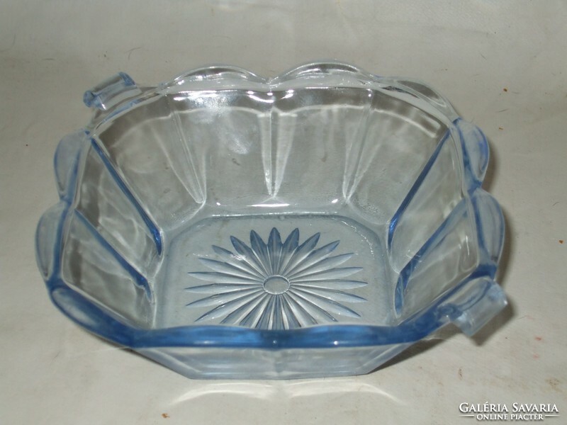 Antique blue glass offering.
