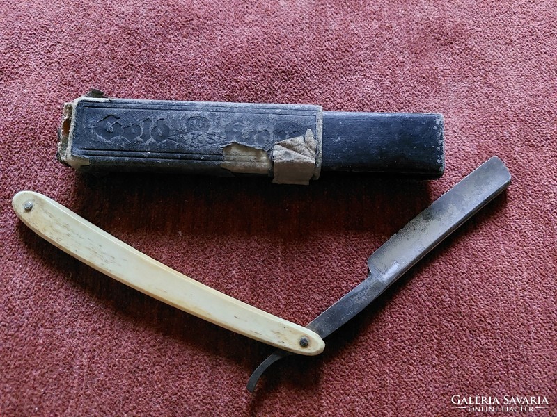 Antique bone-handled razor / barber accessory