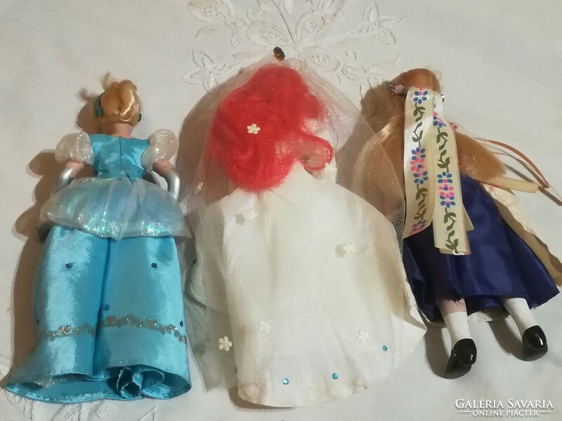 Porcelain doll, princess and folk dress.