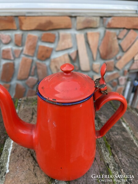 A rare shaped red coffee pot with enamelled village peasant nostalgia