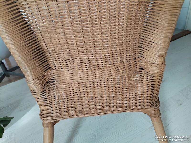 Rattan back chair - in a colonial atmosphere
