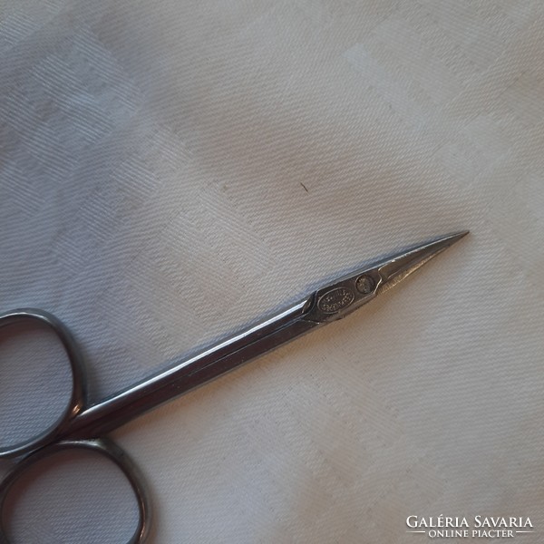 Old, special manicure set with marked Solingen scissors, in a leather case.