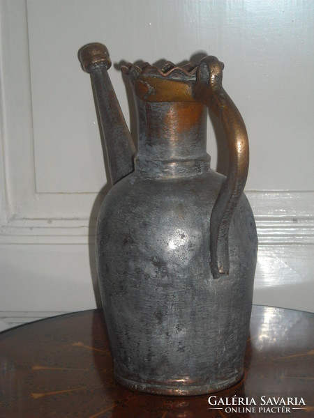 Antique copper jug