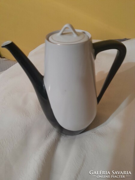 A black and white hollohazi jug is rare