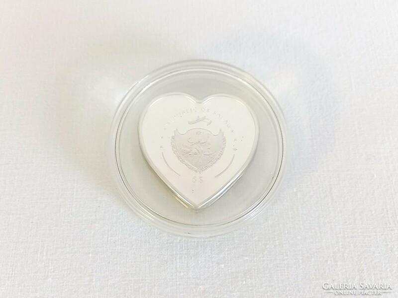 Heart-shaped silver coin with angel motif, Swarovski crystal