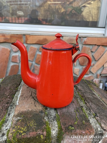 A rare shaped red coffee pot with enamelled village peasant nostalgia
