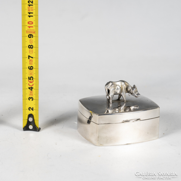 Silver art deco style box with a cow figure