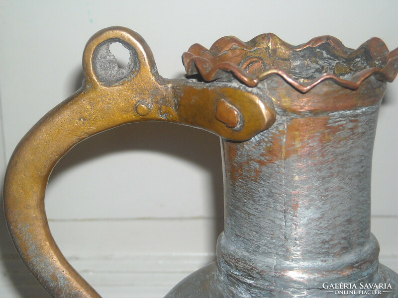 Antique copper jug