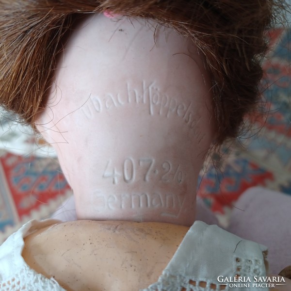 Antik porcelánfejű Heubach baba, jelzett, sorszámozott