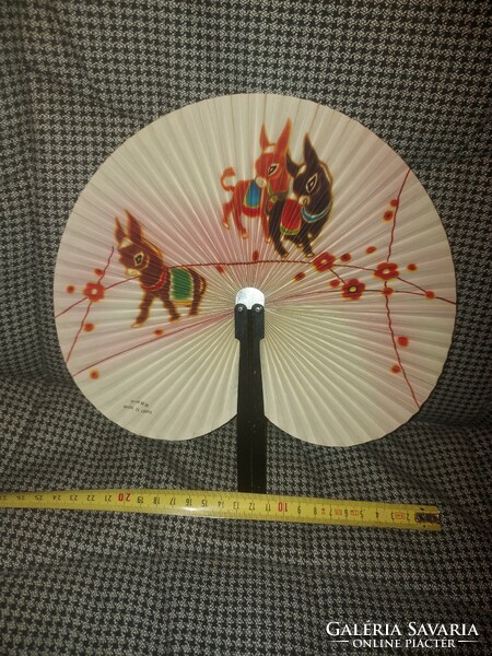 Oriental fan, in a metal case