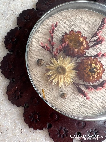 Retro wall decoration - dried flowers under glass in a leather frame.