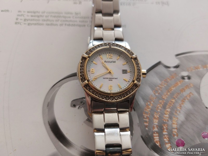 (K) beautiful women's accurist watch with steel case