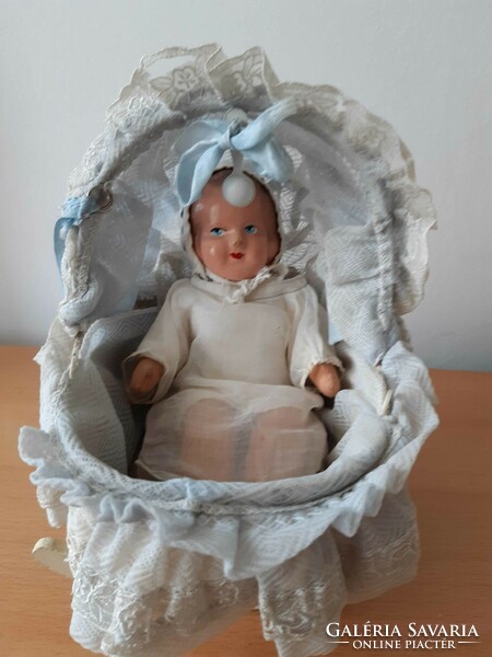 Old vintage baby in cradle