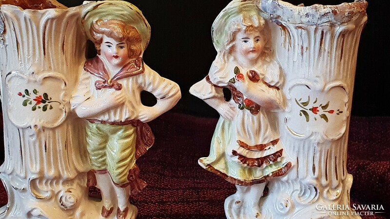 2 pcs. Antique, porcelain, figural vase. Girl and boy figure. They are 13 cm high.