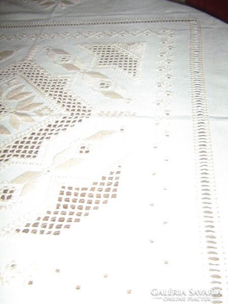 Beautiful cream-colored embroidered azure woven needlework tablecloth