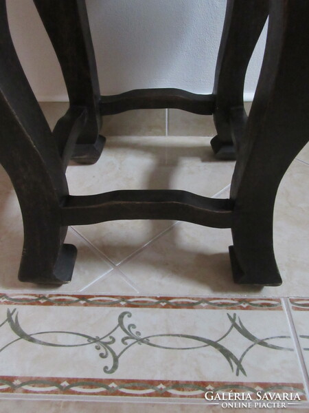 Old seat, chair, footstool, ottoman, maybe a small table, storage, flower stand