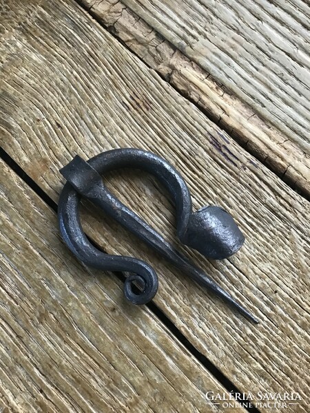 Old wrought iron fibula