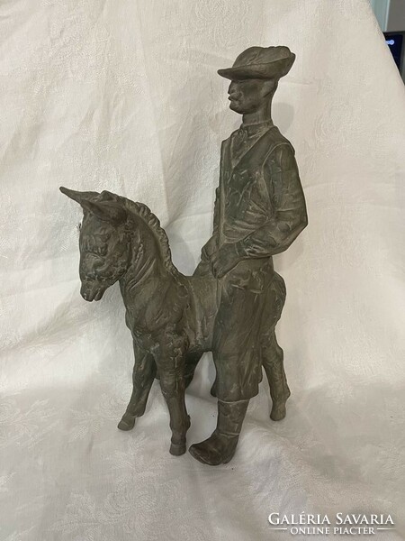 Terracotta statue - shepherd on donkey's back