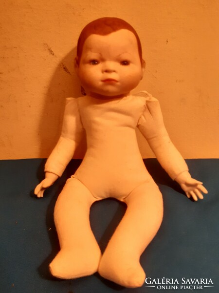 Some old porcelain head? Midwife