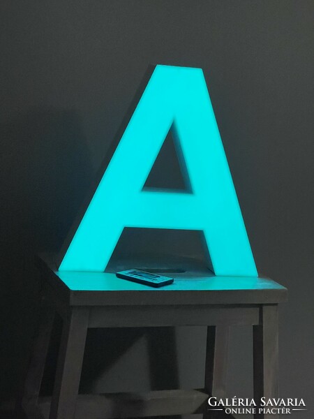 Color-changing monogrammed LED mood lamp for children's rooms